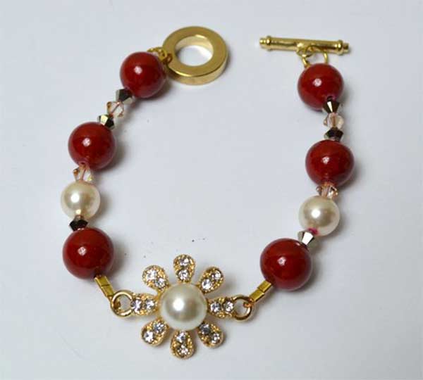 Βραχιόλι από πέρλες Swarovski σε σχήμα κώνου σε ροζ χρυσό 