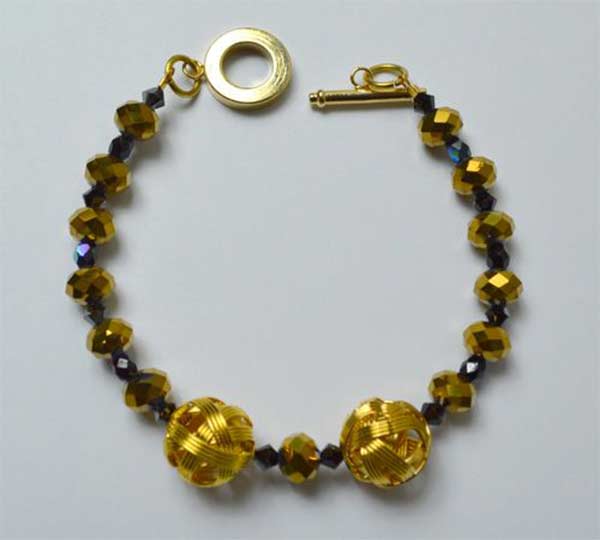 Βραχιόλι από πολυεδρικές κρυστάλλινες χάντρες Swarovski 